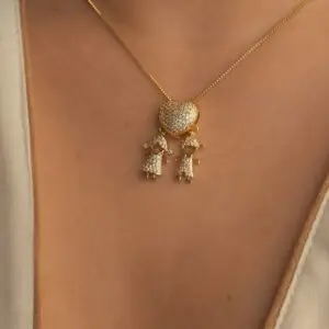 a person wearing a gold necklace